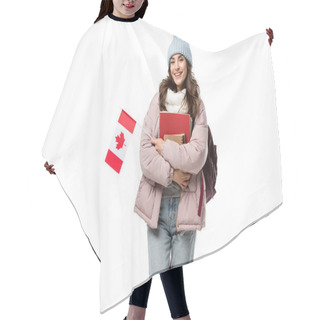 Personality  Happy Female Student In Winter Clothes With Canadian Flag And Notebooks Isolated On White, Studying Abroad Concept Hair Cutting Cape