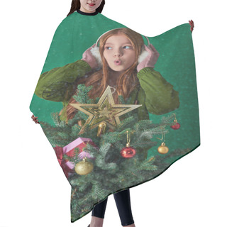 Personality  Holiday Spirit, Surprised Girl In Ear Muffs Hugging Decorated Christmas Tree On Turquoise Backdrop Hair Cutting Cape