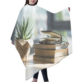 Personality  Close-up View Of Books, Notebook With Pencil And Potted Plant On Wooden Table  Hair Cutting Cape