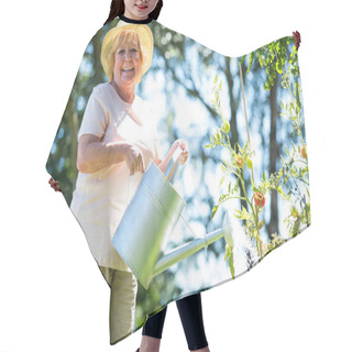 Personality  Senior Woman Watering Plants With Watering Can Hair Cutting Cape