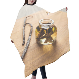Personality  Glass Bottle Of Essential Oil With Vanilla Pods On Wooden Cutting Board Hair Cutting Cape