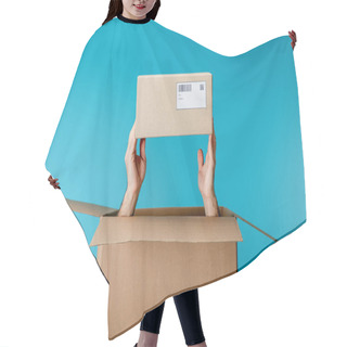 Personality  Cropped View Of Courier Holding Cardboard Box From Package Isolated On Blue Hair Cutting Cape