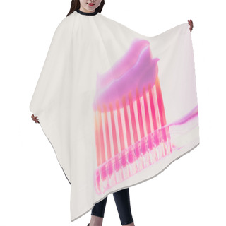 Personality  Pink Plastic Toothbrush With A Thick Layer Of White Toothpaste On An Isolated Background. Side View Hair Cutting Cape
