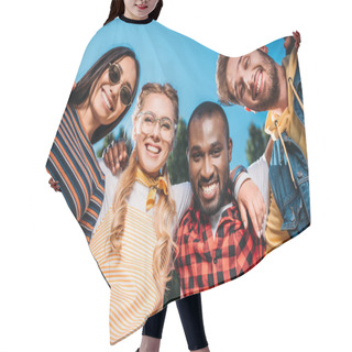 Personality  Bottom View Of Smiling Multiracial Young Friends Looking At Camera With Blue Sky On Background Hair Cutting Cape