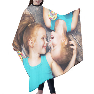 Personality  Fine Portrait Of A Twin Sisters Holding Lollipops Hair Cutting Cape