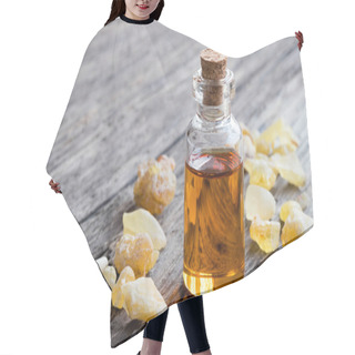 Personality  A Bottle Of Frankincense Essential Oil With Frankincense Resin O Hair Cutting Cape