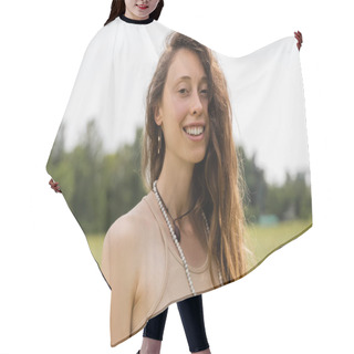Personality  Portrait Of Smiling Brunette Woman Smiling At Camera In Field  Hair Cutting Cape
