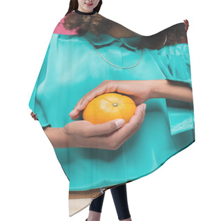 Personality  Partial View Of African American Woman In Turquoise Blouse Holding Whole Orange Isolated On Pink Hair Cutting Cape