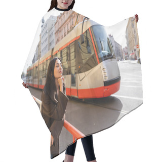 Personality  Stylish Traveler Standing Near Blurred Tram On Street In Prague  Hair Cutting Cape