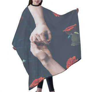 Personality  Cropped Shot Of Couple Holding Hands Above Black Fabric With Red Roses Hair Cutting Cape
