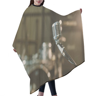 Personality  Close-up Shot Of Vintage Microphone On Stand Against Blurred Drum Set Hair Cutting Cape