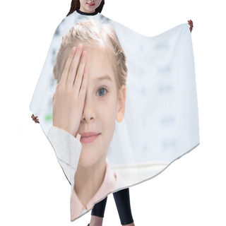Personality  Little Child Closing Eye With Eye Test Behind Hair Cutting Cape