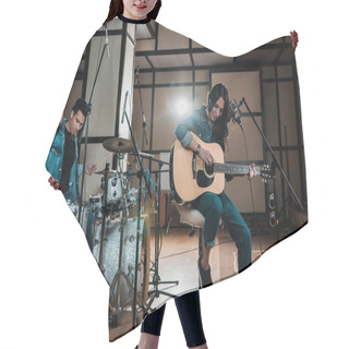 Personality  Beautiful Woman Playing Guitar While Mixed Race Musician Playing Drums In Recording Studio Hair Cutting Cape