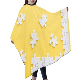 Personality  Top View Of Incomplete Connected Puzzle Pieces Near Finished Line Isolated On Yellow  Hair Cutting Cape