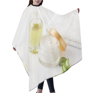 Personality  Closeup Shot Of Organic Oil And Cream, Dropper, Towel And Aloe Vera Slices  Hair Cutting Cape