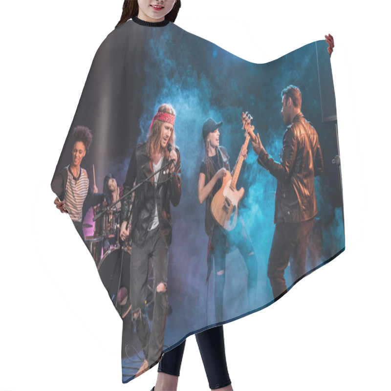 Personality  Rock band on stage hair cutting cape