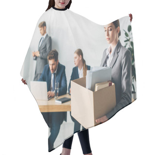 Personality  Dismissed Woman Holding Cardboard Box Near Colleagues Working In Office  Hair Cutting Cape