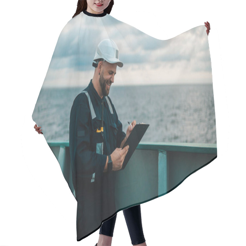 Personality  Deck Officer On Deck Of Offshore Vessel Or Ship , Wearing PPE Personal Protective Equipment Hair Cutting Cape