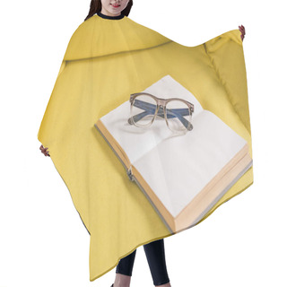 Personality  Close-up View Of Eyeglasses And Book With Blank Pages On Yellow Couch Hair Cutting Cape