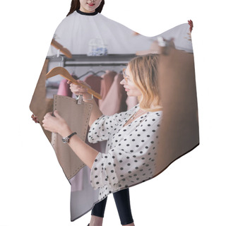 Personality  Young Clothes Designer Holding Templates In Atelier On Blurred Foreground Hair Cutting Cape