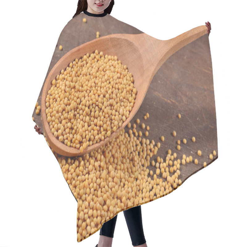 Personality  White mustard seeds in a spoon hair cutting cape