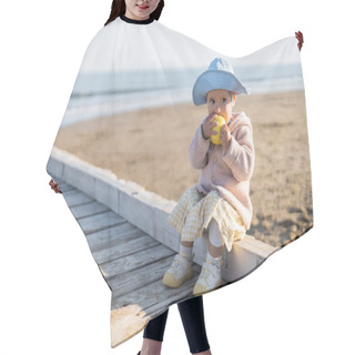 Personality  Toddler Kid Eating Ripe Apple While Sitting On Wooden Pier In Italy  Hair Cutting Cape