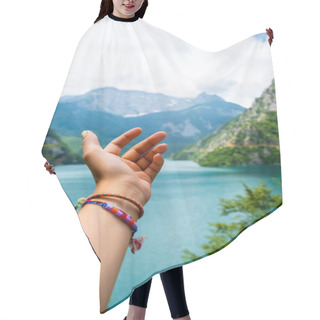 Personality  Cropped Image Of Woman Reaching Out Hand For Beautiful Piva Lake (Pivsko Jezero) In Montenegro Hair Cutting Cape