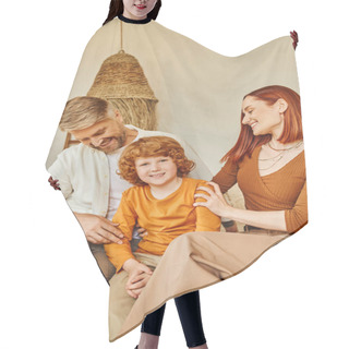 Personality  Smiling Husband And Wife Embracing Redhead Kid While Sitting In Bedroom, Emotional Connection Hair Cutting Cape