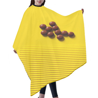 Personality  Top View Of Pile With Dark Round Shape Pills On Yellow And Textured Background  Hair Cutting Cape