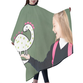 Personality  Schoolgirl Pointing With Hand At Illustrated Dinosaur On Green Chalkboard  Hair Cutting Cape
