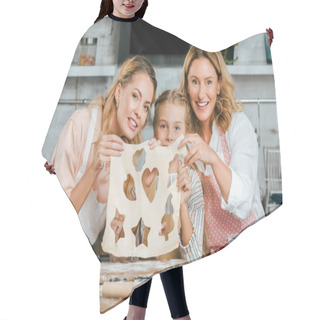 Personality  Happy Child With Mother And Grandmother Holding Cutted Dough With Heart, Star And Christmas Tree Shaped Holes At Home Hair Cutting Cape