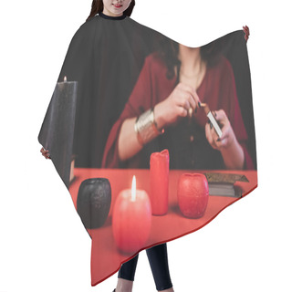 Personality  Cropped View Of Blurred Fortune Teller Holding Matches Near Candles And Tarot Cards Isolated On Black  Hair Cutting Cape