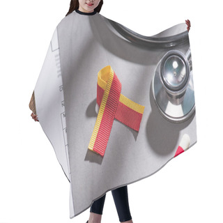 Personality  Selective Focus Of Ribbon, Stethoscope, Pills And Folder On Table, World Hepatitis Day Concept Hair Cutting Cape