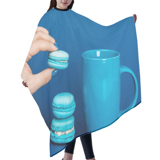 Personality  Cropped View Of Woman Holding French Macaroon Near Cup On Blue Background  Hair Cutting Cape
