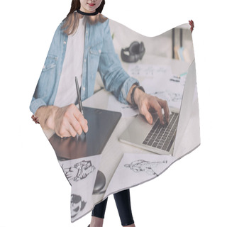 Personality  Cropped View Of Animator Using Gadgets Near Sketches  Hair Cutting Cape