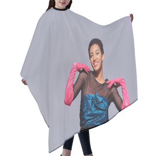 Personality  Trendy Young African American Woman In Pink Gloves And Cocktail Dress Touching Shoulders And Smiling Isolated On Grey, Modern Generation Z Fashion Concept Hair Cutting Cape