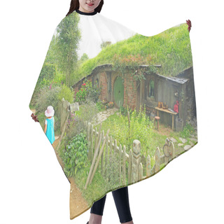 Personality  MATAMATA, NEW ZEALAND - JANUARY 15, 2015: Hobbiton - Fictional V Hair Cutting Cape