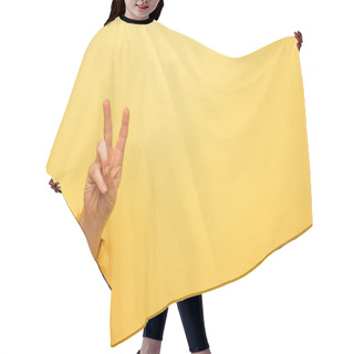Personality  Cropped View Of Man Showing Peace Sign Through Yellow Paper Hole  Hair Cutting Cape