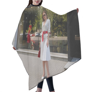 Personality  Beautiful Model Look Brunette Female Wearing White Dress With Black Polka Dots Is While Waking On A City Street Background With Stylish Bags In The Hand. Hair Cutting Cape
