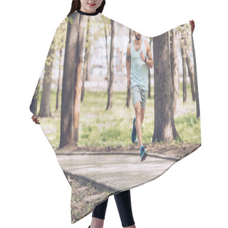 Personality  Handsome Man In Sportswear Running Along Walkway In Sunny Park Hair Cutting Cape