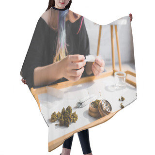 Personality  Selective Focus Of Girl Rolling Joint And Medical Marijuana, Joints And Herb Grinder On Table  Hair Cutting Cape
