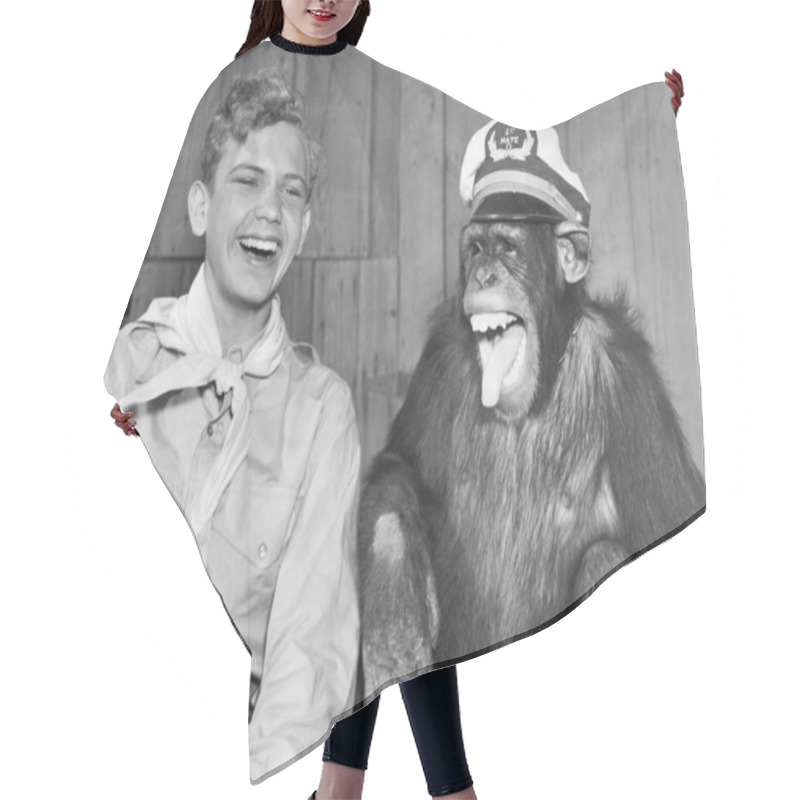 Personality  Laughing boy scout and monkey wearing hat hair cutting cape