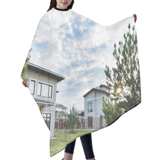 Personality  Unfinished Modern Buildings With Green Yards On Cloudy Day With Fir Trees On Foreground  Hair Cutting Cape