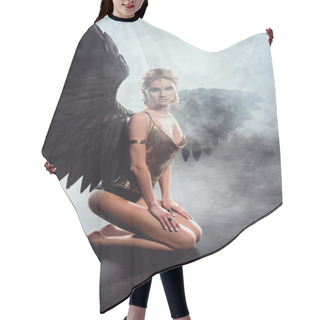 Personality  Beautiful Sexy Woman With Black Angel Wings Sitting, Looking At Camera And Posing On Dark Background Hair Cutting Cape