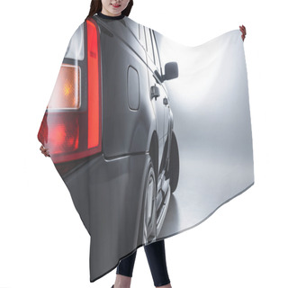 Personality  Close Up View Of Rear Headlight Rear Of Luxury Black Car On Grey Backdrop Hair Cutting Cape