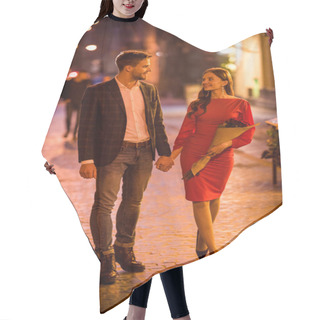 Personality  Happy, Elegant Couple Holding Hands And Looking At Each While Walking On Street At Night Hair Cutting Cape