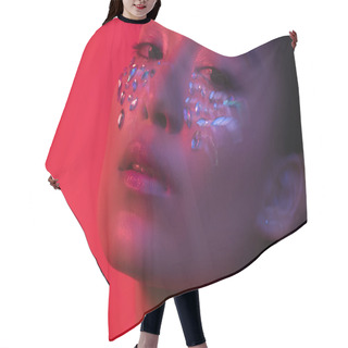 Personality  Beautiful Asian Girl With Rhinestones On Face Isolated On Red, Motion Blur Hair Cutting Cape