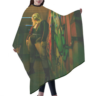 Personality  A Woman Standing Next To A Vibrant, Multi-colored Wall Hair Cutting Cape