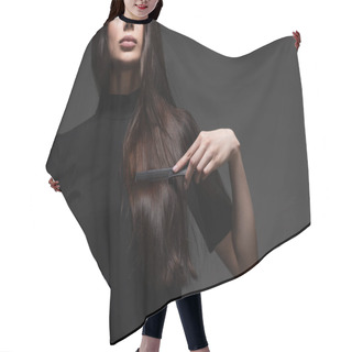 Personality  Cropped View Of Young Woman Brushing Long Shiny Hair With Comb Isolated On Dark Grey Hair Cutting Cape