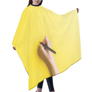 Personality  Cropped View Of Designer Holding Stylus On Yellow  Hair Cutting Cape